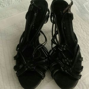 Strappy black leather heels